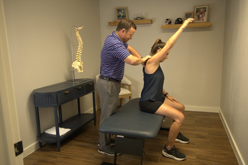 Dr. Clark assessing a patient’s range of motion